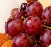 Grapes and dried apricots on a grazing table
